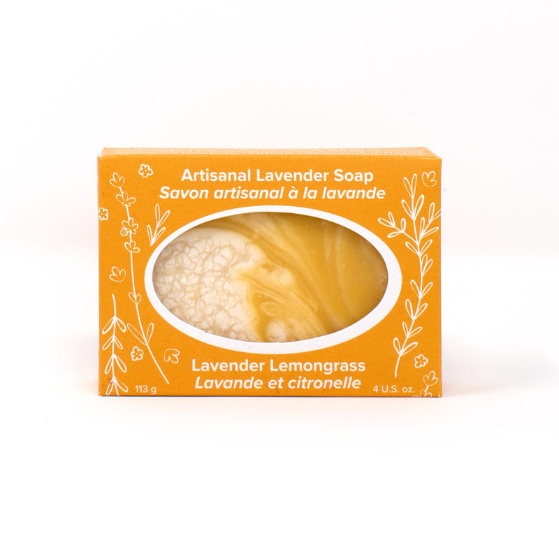 A marbled yellow and cream bar of soap in a bright yellow box with white line drawings of lavender sprigs and flowers. Text reads Artisanal Lavender Soap (Lavender Lemongrass)