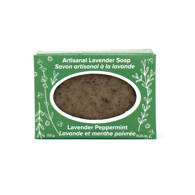 An olive-coloured bar of soap in a kelly green box with white line drawings of lavender sprigs and flowers. Text reads Artisanal Lavender Soap (Lavender Peppermint)